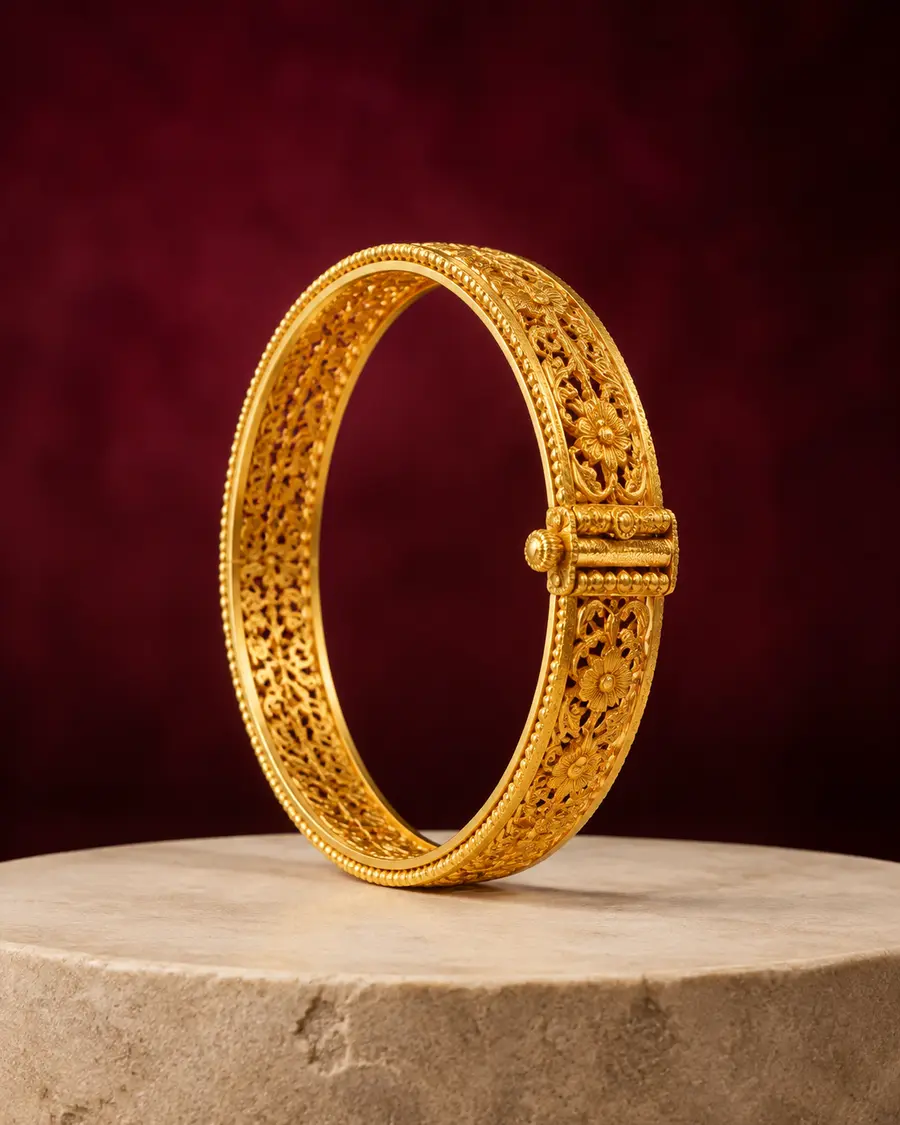 Premium gold kada catalogue design on a burgundy and ivory studio background